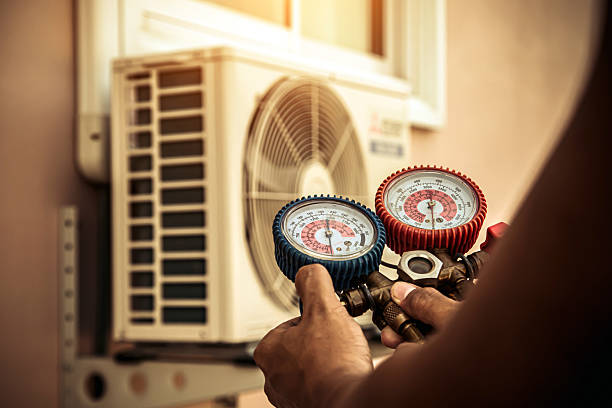 Professional Heat Pump Repair technician working in Bullard, TX